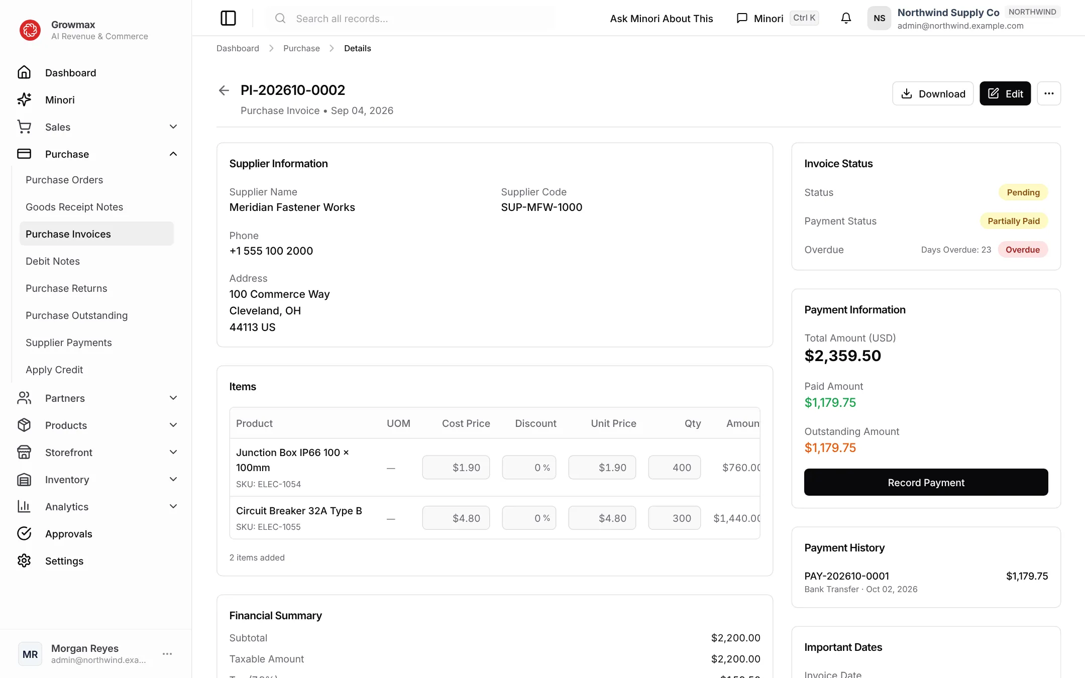 A purchase invoice with its lines, totals and payment status